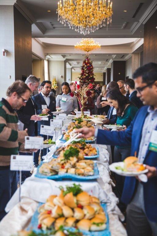 People eating from a buffet