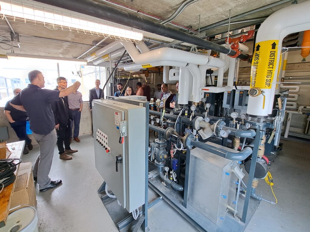 ELC members looking at Sheridan College's district energy controls.